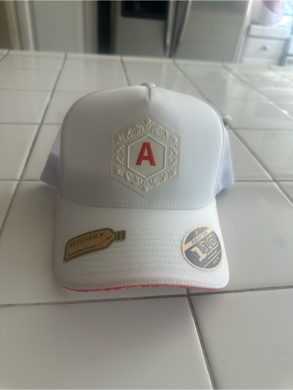 White Trucker Hat with Red 'A' Emblem